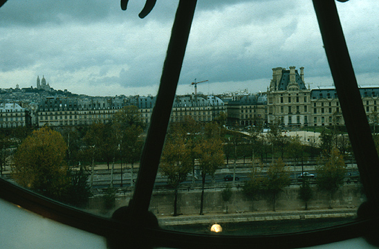 View towards Sacre Coeur through the clock of the Muse d'Orsay