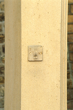 'Passing Through' - light switch carved in free-standing door
