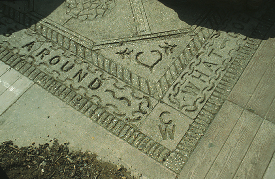 'The Red House' - detail: corner of carpet with artist's initials
