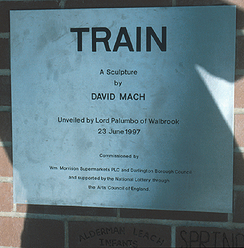 'Train' - plaque with details of commission
